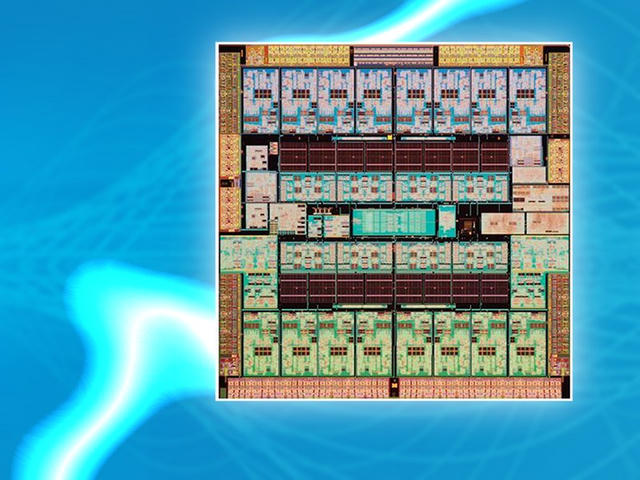 Close-up of a computer processor chip die, showing multiple symmetrical colored cores and circuit blocks on a blue tech-themed background.